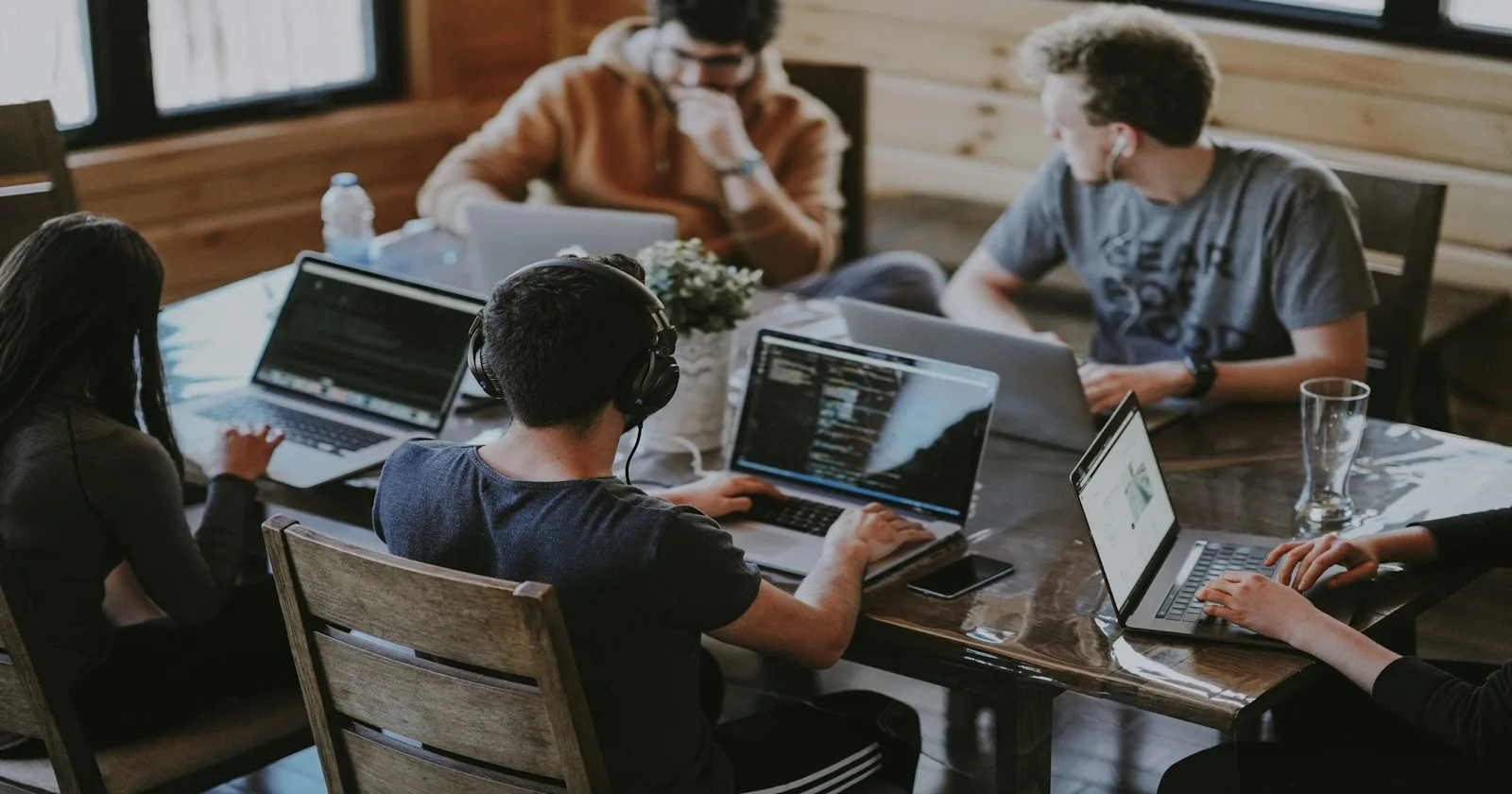 Tools, games & AI in your browser Team collaborating on laptops